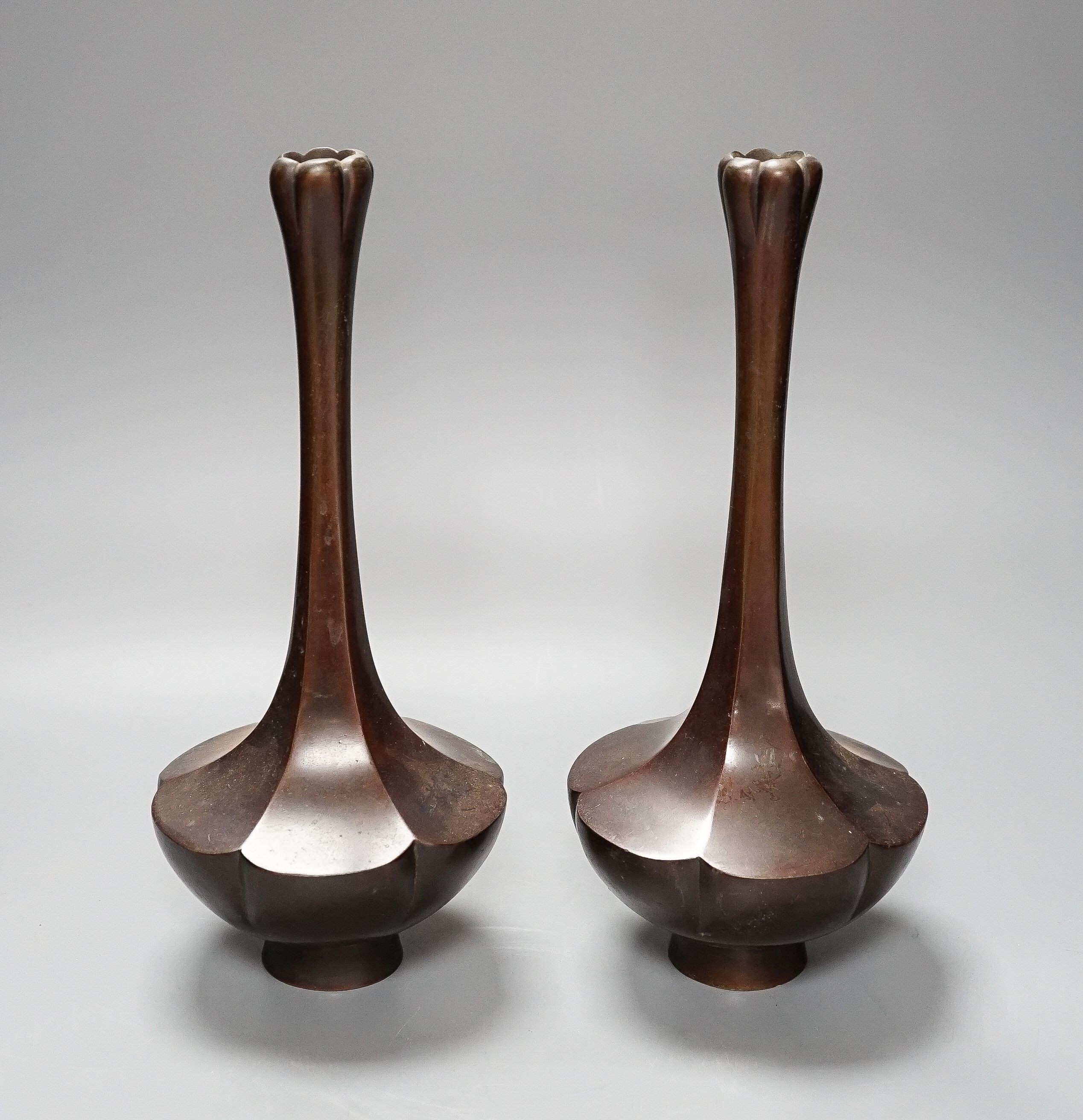A pair of Japanese Meiji bronze bottle vases 31cm one base panel lacking